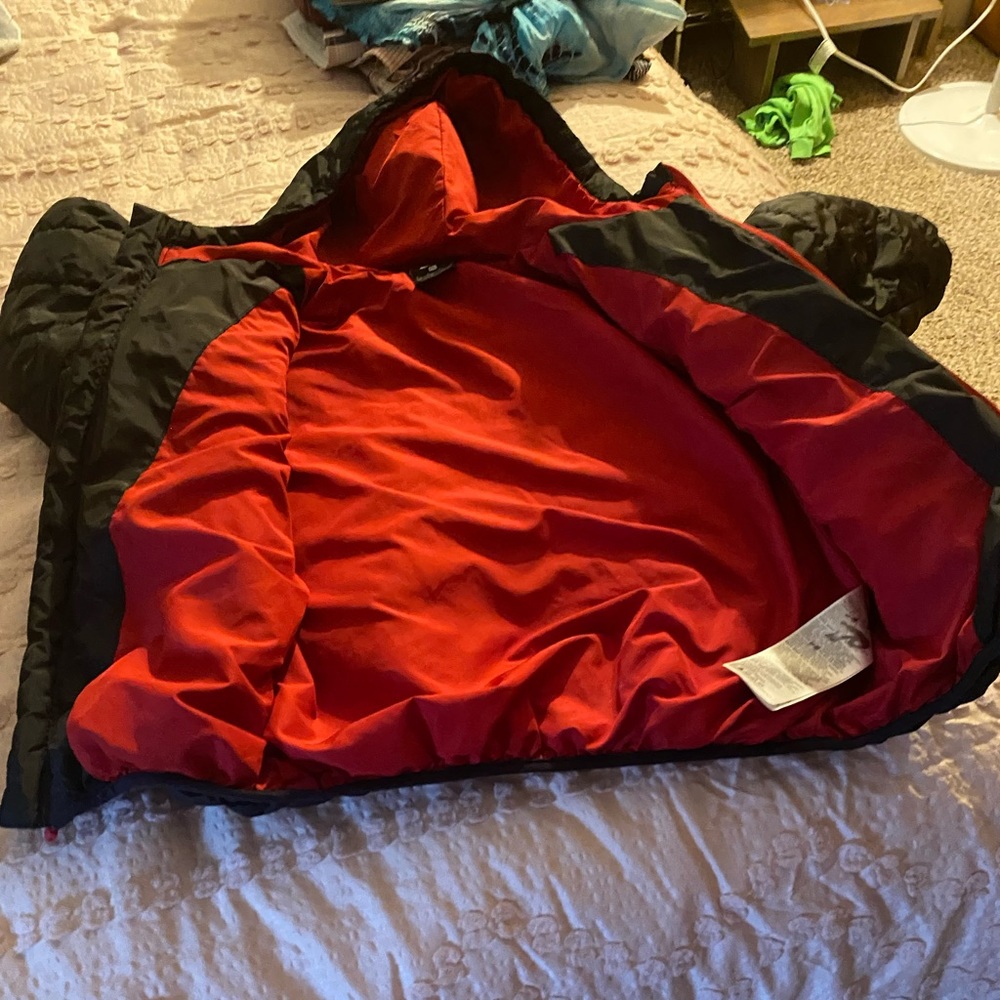 Boys size 7 Nike jacket, black and Red.